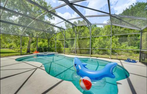Sandy Ridge House | 5bd 4bth Retreat Near Disney Heated POOL w Spa and Jacuzzi