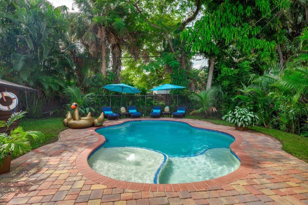 Flamingo Parks House | Beach Retreat with Private Pool, Walk to Downtown, Restaurants & Convention Center