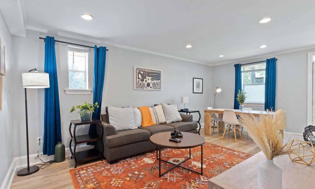 Lower Garden District Condo | Bright 1BR/2BA Garden District condo with wrap balcony, gated parking, pet-friendly, steps to Magazine