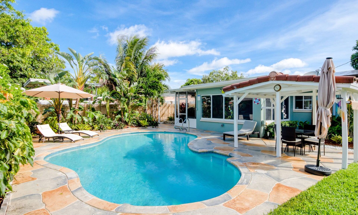Survey Creek House | Charming home with oasis-like backyard, pool, washer/dryer, & central AC