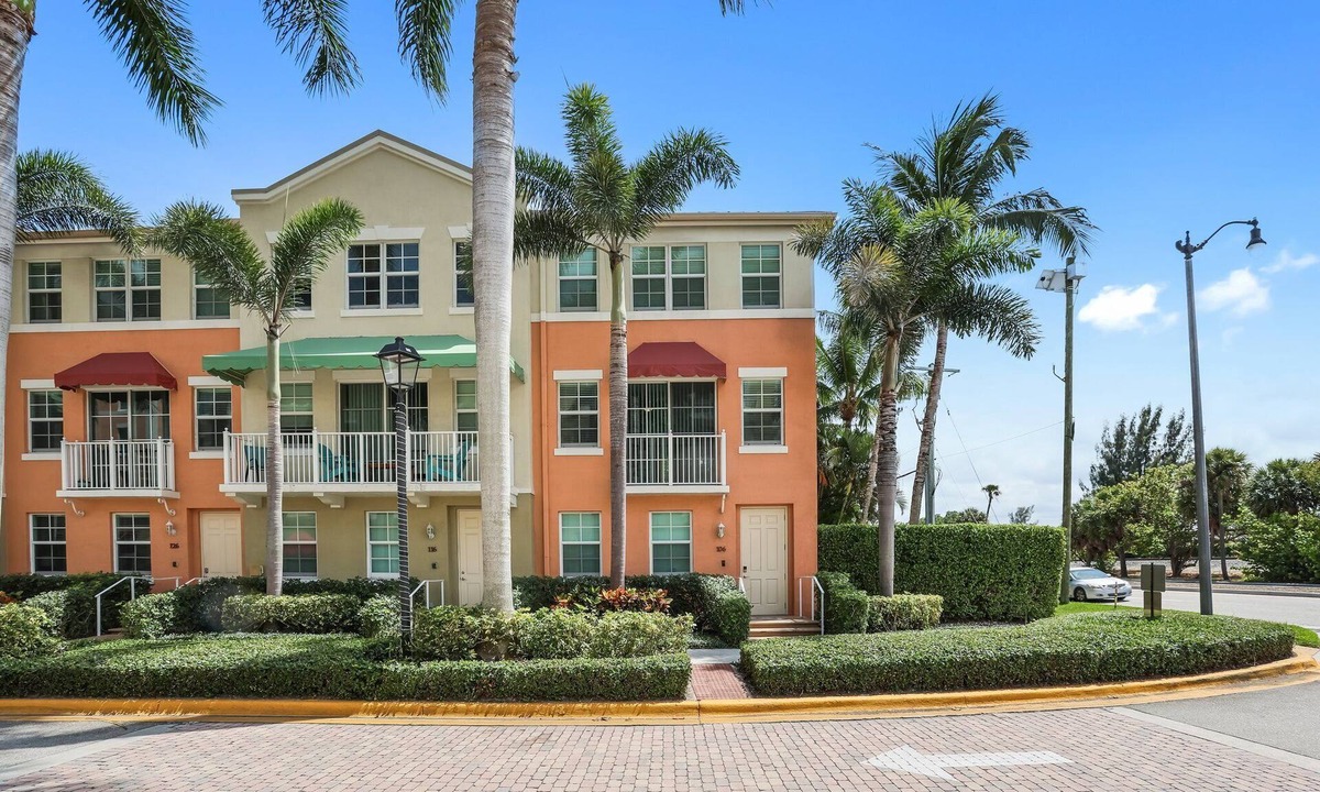 East Ocean Ave House | Cozy orange beachside townhouse with yard, Wi-Fi, & full kitchen in Lantana!