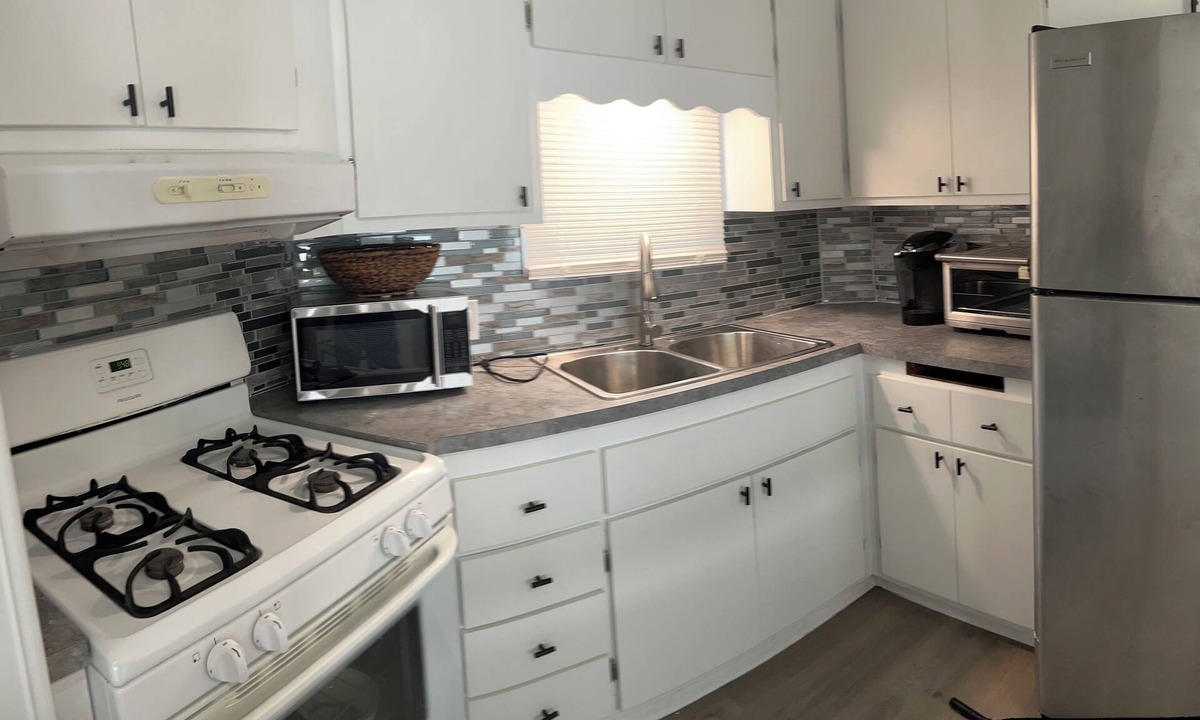 Twin Lakes House | Dog-Friendly, Water Front Home with Tiki Hut and 40 Ft Dock and Launch