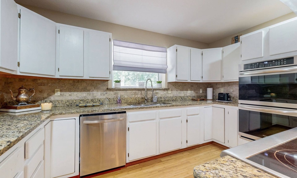 Hoyt House | Gorgeous Lakefront Home, private dock and short walk to beach