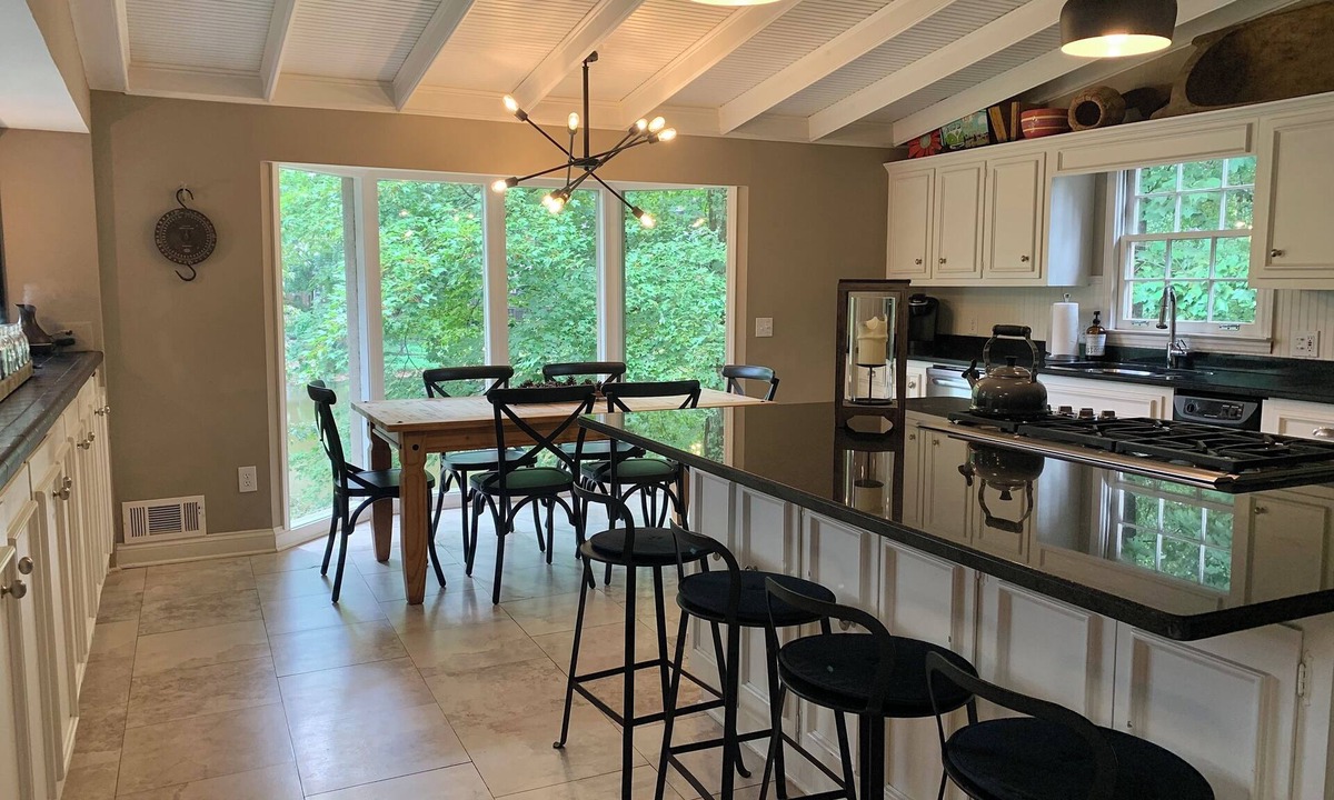 Roswell House | Luxury stay on a lake open plan huge kitchen games rm bar firepit luxury bedding