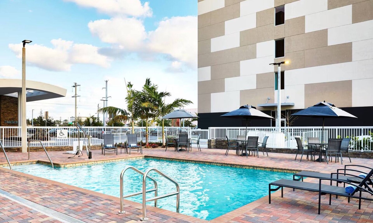 Doral Hotel | Modern & Comfortable 3 Rooms – Outdoor Pool, Fitness Center, Breakfast Included