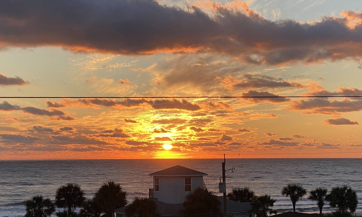 Bahama Beach Condo | Remodeled 3 BR 2BA condo steps to the beach! Sunset views and private garage.