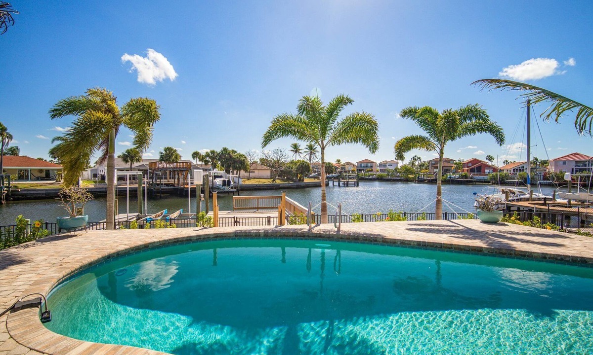 Bal Harbour House | Saltwater canal front 4 bedroom tropical home with private pool and boat dock