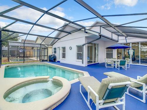 Four Corners House | Screened pool home w arcade & resort perks