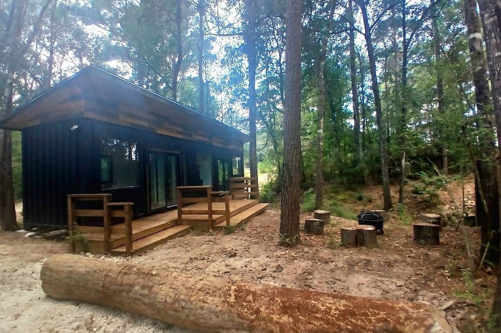 Plantersville Cabin | Secluded Container with BBQ for a Waterfront Retreat, Perfect for Fishing and Roasting S'Mores in Grimes County, Texas
