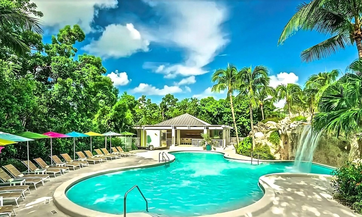 Rock Harbor Hotel | Settle into comfort in our Waterfront Room in the Hammock Wing, featuring two qu