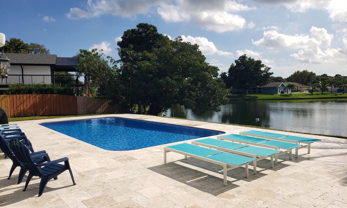 Survey Creek House | Spacious Modern Waterfront Lake Home with Heated Pool/15 min Drive to Beach!