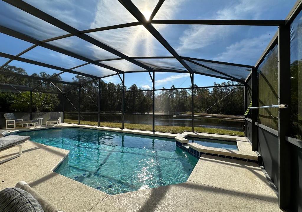 Sandy Ridge Villa | Sunny lake view villa with pool spa - close to attractions