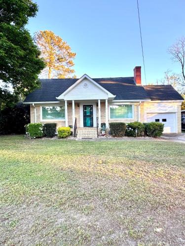 Augusta House | The Tee Time Cottage