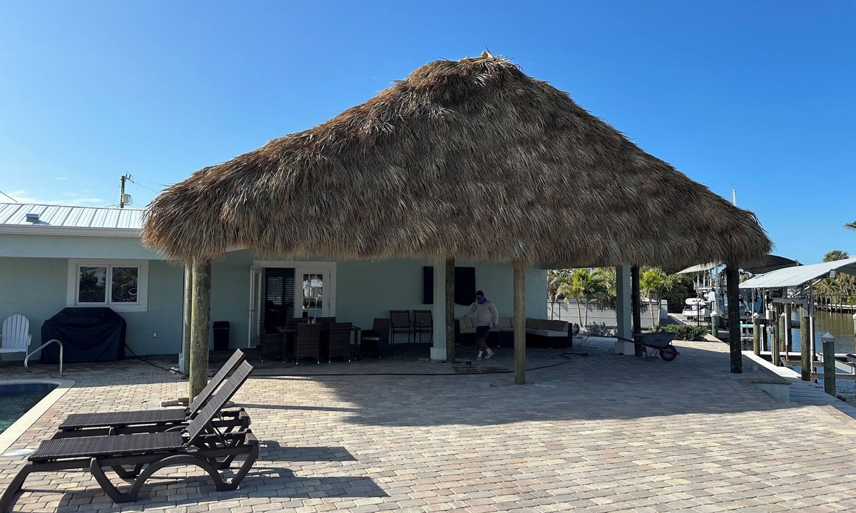 Saint James City House | TWO MASTER SUITES-POOL -WATERFRONT ON CORNER LOT - BOAT LIFT -OUTDOOR KITCHEN