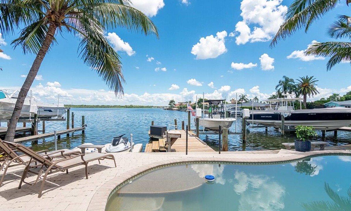 North Redington Beach Resort | Waterfront with views of Pool, Intercoastal Water and use of 19ft Boat