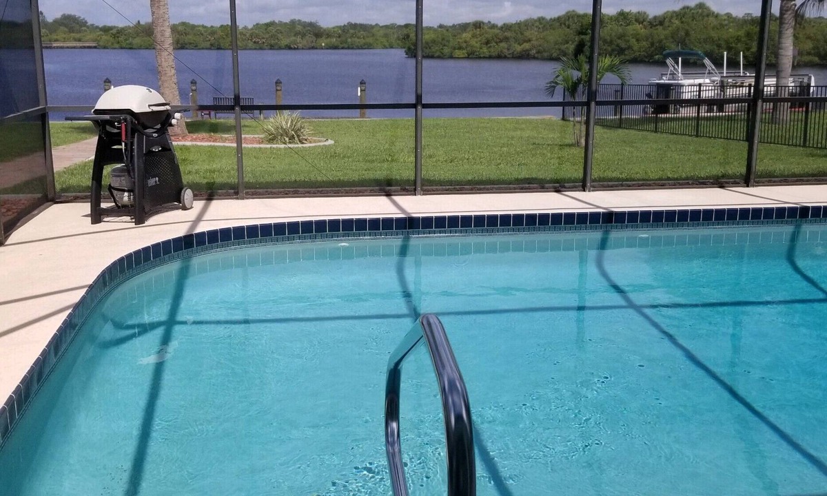Port Charlotte House | Waterfront 3-bedroom pool house in fabulous Port Charlotte with WiFi, AC