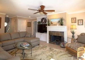 on canal with dock~walk to beach, marina, activity center~screened patio
