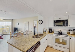 Second-Floor Condo w/Private Covered Balcony, Views, Free WiFi, and Shared Pool