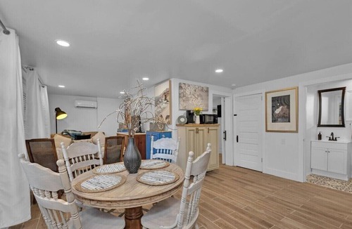 Summerville House | 1 bedroom, 1 bathroom sleeps max 4 guests with the sleeping arrangements being a king bed and futon that sleeps 2