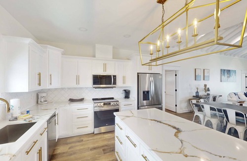 Dauphin Island House | 2 dog-friendly beach houses right on the sand w/private heated pool & elevator