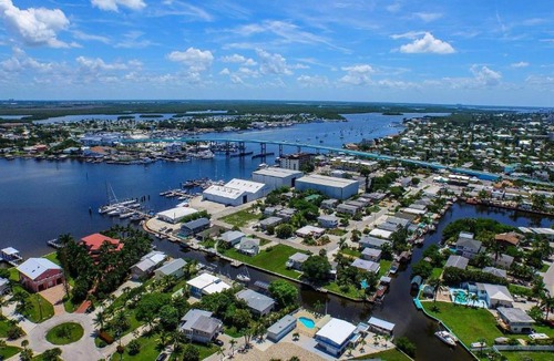 Fort Myers Beach House | 331 Palermo Circle - Chic & cozy beach home with pool and bayfront view!