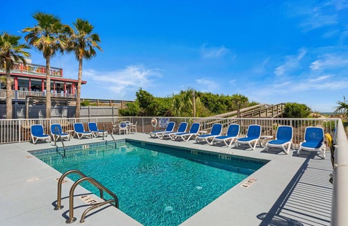 Isle of Palms Condo | 4 BR Top Floor Oceanfront Condo | Pet Friendly | Pool | Free Wifi & Parking