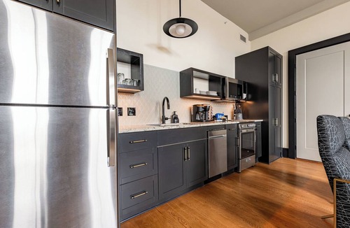 Central Business District Hotel | 4BR Rare Group Space + Private Patio on Canal St | The Mayfair