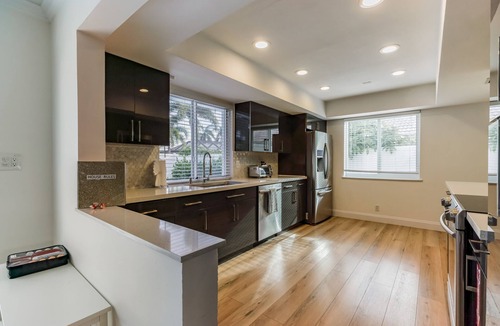 Imperial Point House | 5 min to beach/Lux modern home/Exceptional outdoor area/pool/games