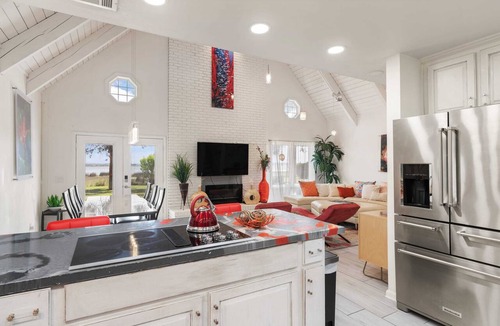 Brunswick House | 82 Palms - Waterfront Home & Rooftop Sun Deck