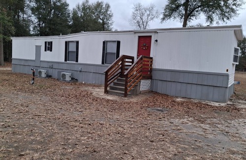 Rupert House | Adorable 2-bedroom, sleep sofa in living room mobile home with AC in Oglethorpe