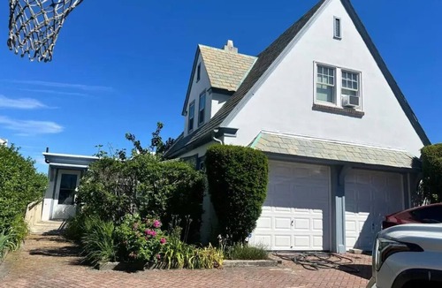 A-Zone House | Bayfront 6-bedroom home, sleeps 16 with AC, in-ground pool and spa. Dog friendly
