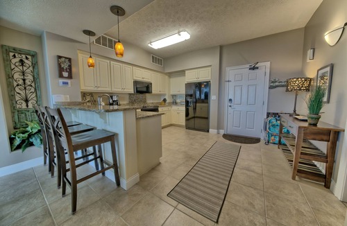 Thomas Drive Condo | Beachfront, all tiled unit. Beach chairs included Mar-Oct.