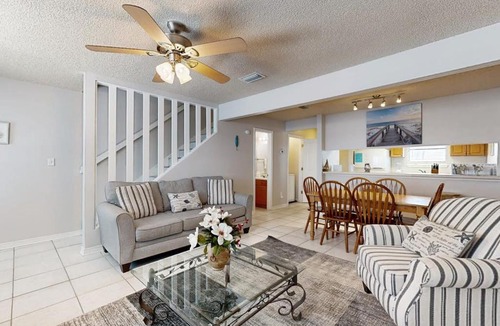 Sugar Beach House | Beachfront townhome with on-site beach access heated pool patio grill AC WD