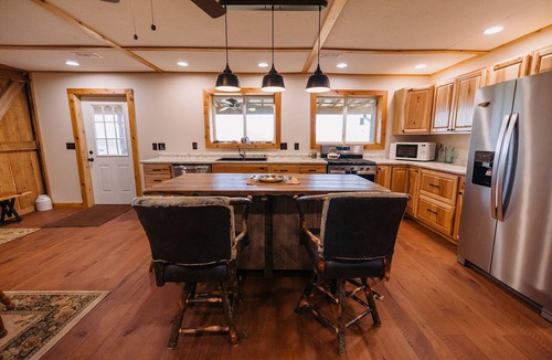 Mount Vernon Cabin | Beautiful Cabin Nestled in a Peaceful Wooded Setting with a Scenic Pond.