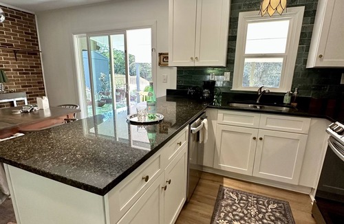 Perry House | Beautiful Green House with a huge Backyard! Just 1 mile from Downtown Perry