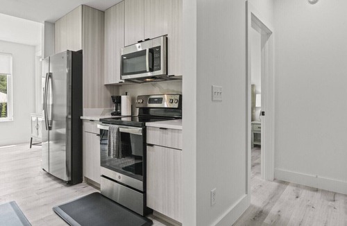 Gulfport Condo | Brand New 2 Bedroom Condo-Luxurious Waterfront Pool-Sleeps 4