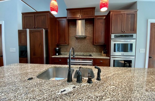 Dahlonega House | Breathtaking view on the Chestatee River, riverside fire pit, and pet friendly