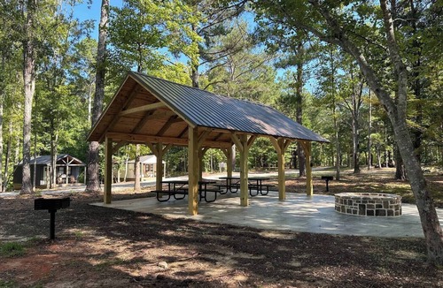 Hartwell RV Rental | Cabin #5: One bedroom with full kitchen and a large gravel parking pad beside the cabin for easy boat or trailer storage.