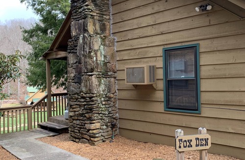 Rabun Gap Cabin | Cabin on a hillside overlooking beautiful Valley Springs Lake pet friendly (dog)