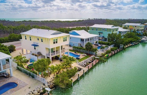 Marathon Villa | Canal Front with Large Custom Pool, Lush Landscaping, Hot Tub, 30' Dock, Kayaks!