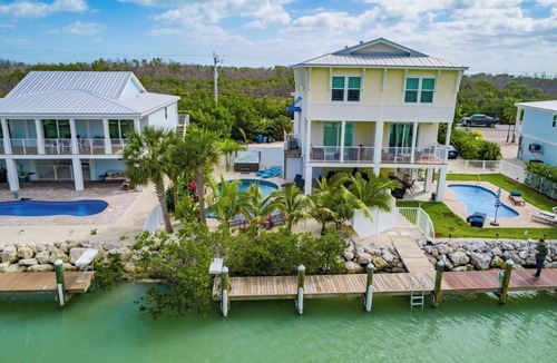 Marathon Villa | Canal Front with Large Custom Pool, Lush Landscaping, Hot Tub, 30' Dock, Kayaks!