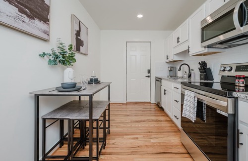 Civil Rights Historic District Condo | Central Duo Suites - Big Groups/Parking/Queen Beds