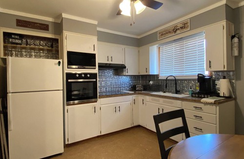 Atchison House | Charming 2-bedroom house on quiet brick and tree lined street.