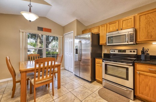Kissimmee Villa | Charming 3BR home in Kissimmee with private pool and lake view, perfect for families.