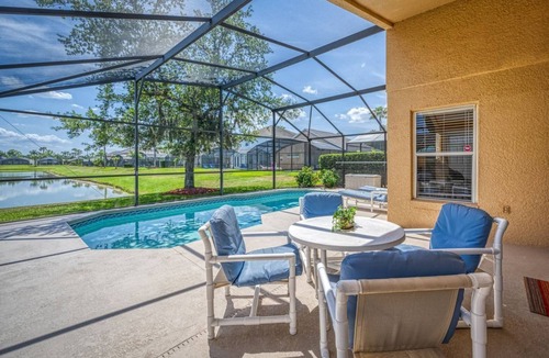 Kissimmee Villa | Charming 3BR home in Kissimmee with private pool and lake view, perfect for families.