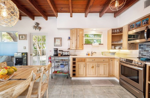 Upper Matecumbe Key Cottage | Charming Bayfront Cottage in Heart of Islamorada with Heated Pool, Deep Dockage, Kayaks & More