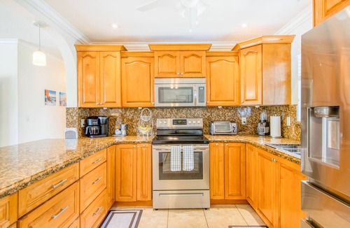 Survey Creek House | Charming home with oasis-like backyard, pool, washer/dryer, & central AC