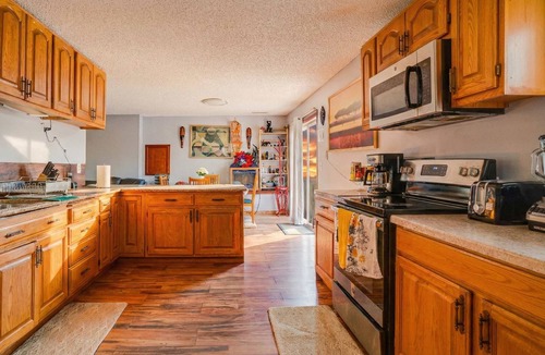 North Saint Paul Apartment | ‼️Chic Basement Getaway w/AC & Fire Pit