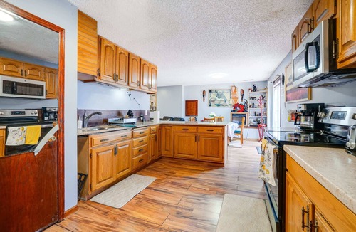 North Saint Paul Apartment | ‼️Chic Basement Getaway w/AC & Fire Pit