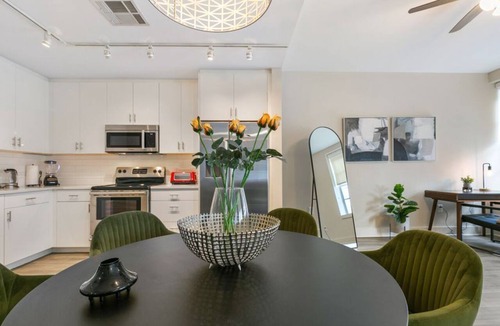 Central Business District Hotel | Chic Elegance in the Heart of NOLA: 4-Bedroom Oasis Awaits!